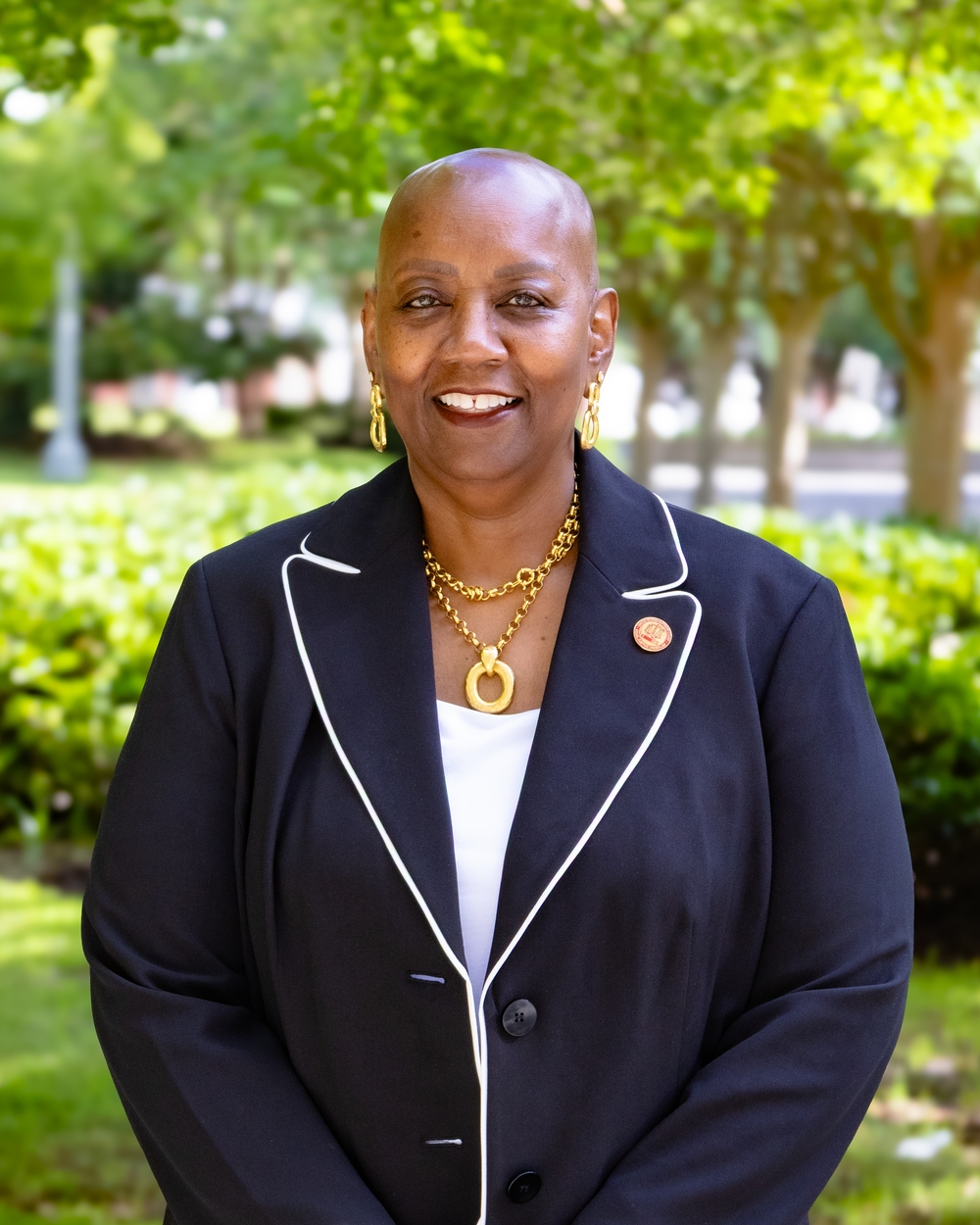 Ms. Monique M. Edwards, in a personal headshot.