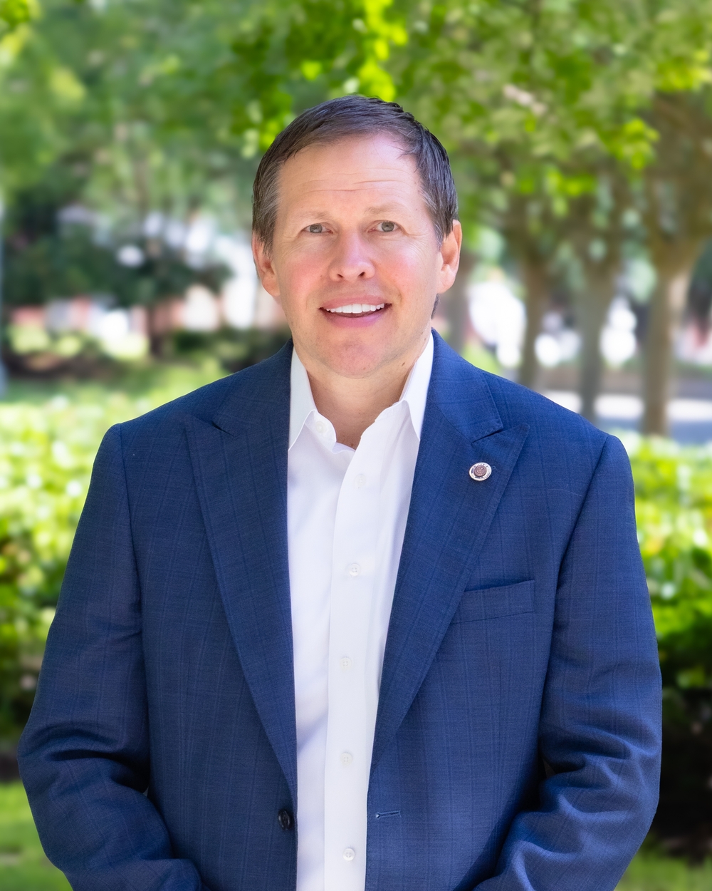Mr. Michael J. Tanner, in a personal headshot.