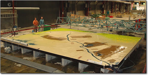 DNR project manager Shannon Dupont and Coastal Engineering Division Director Christopher Knotts review the model of river in Sogreah&rsquo;s laboratory in Grenoble, France in July 2003.